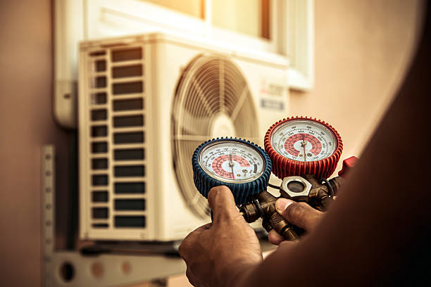 Professional Air Conditioning Service technician working in Hyde Park, NY